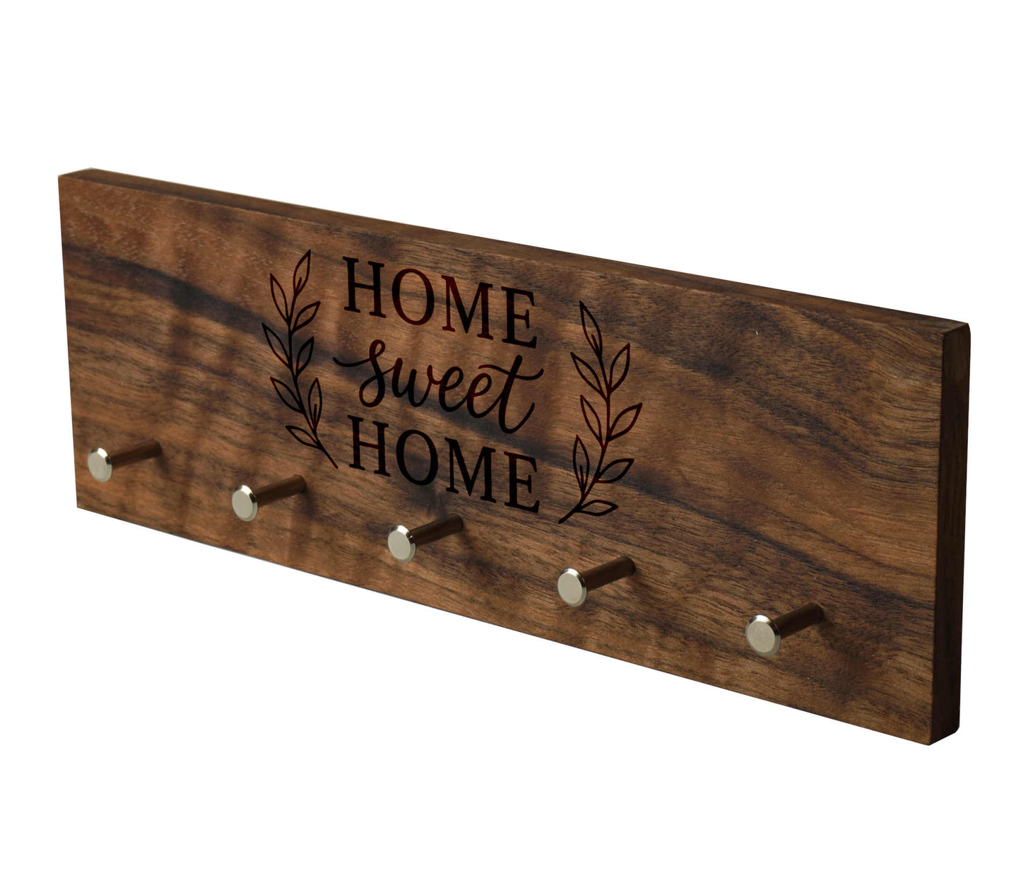 Produktbild Home sweet Home Schlüsselbrett in der vorderansicht.
Nussbaumholz mit modernen Schlüsselhaken.